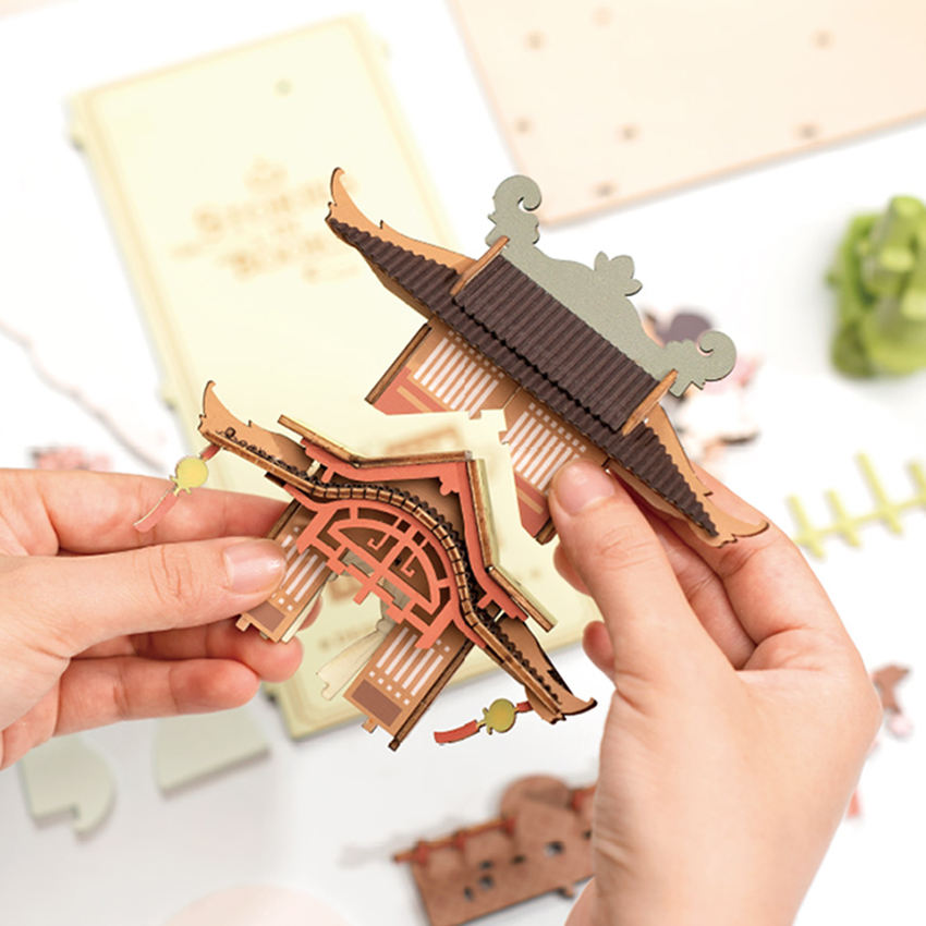 Robotime Rolife Contacto Obtenga un 25% de descuento en rompecabezas de madera 3D TGB05 Falling Sakura Book Nook Casa de muñecas en miniatura para bricolaje